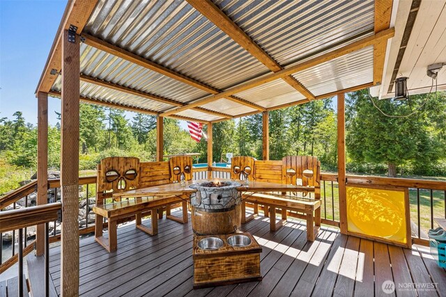 20311 Orting Kapowsin Hwy E, Graham, WA 98338 - wooden deck featuring a fire pit and view of wooded area
