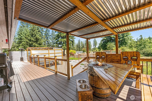 20311 Orting Kapowsin Hwy E, Graham, WA 98338 - deck with a fenced backyard, view of wooded area, and outdoor dining space