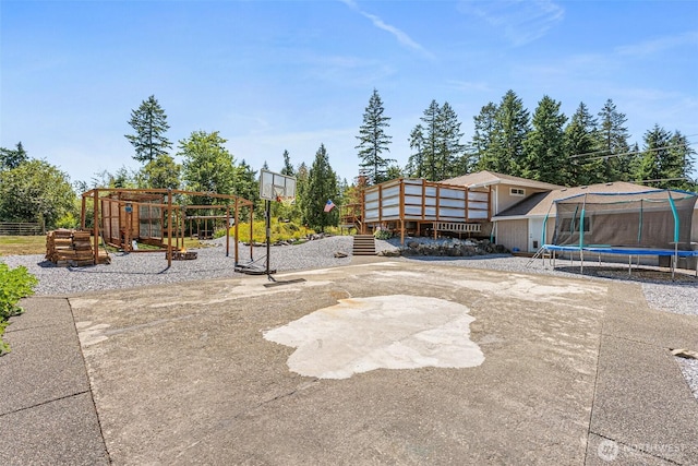 20311 Orting Kapowsin Hwy E, Graham, WA 98338 - view of yard featuring a trampoline, a garden, and a patio