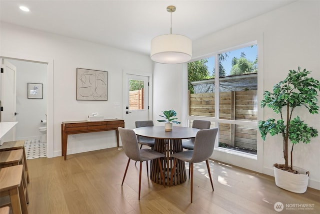 11737 38th Ave NE Unit A, Seattle, WA 98125 - dining room with light wood-type flooring and recessed lighting