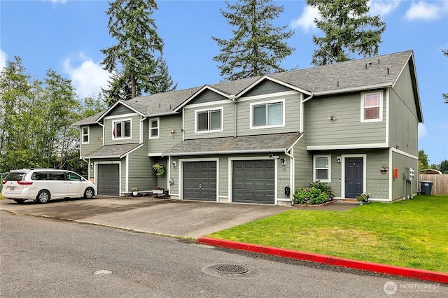 1302 110th St E Unit 37, Tacoma, WA 98445 - townhome / multi-family property featuring a garage, driveway, a front yard, and roof with shingles