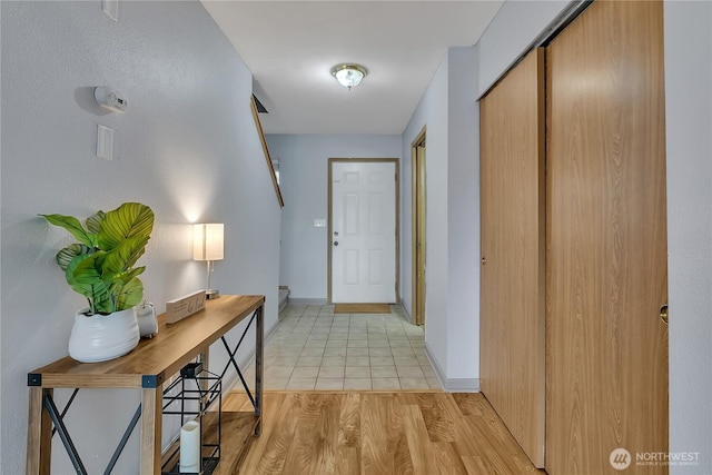 1302 110th St E Unit 37, Tacoma, WA 98445 - hallway with light tile patterned floors and baseboards
