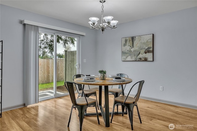 1302 110th St E Unit 37, Tacoma, WA 98445 - dining room with a chandelier and light wood finished floors