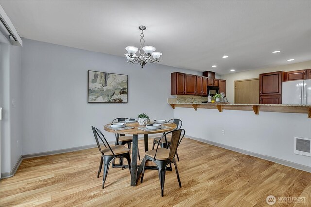 1302 110th St E Unit 37, Tacoma, WA 98445 - dining area with recessed lighting, light wood-style flooring, and a chandelier