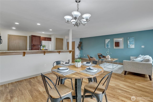 1302 110th St E Unit 37, Tacoma, WA 98445 - dining space featuring recessed lighting, a chandelier, and light wood-style floors
