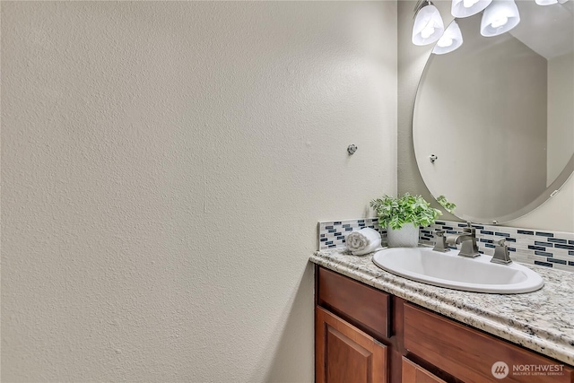 1302 110th St E Unit 37, Tacoma, WA 98445 - bathroom featuring backsplash and vanity