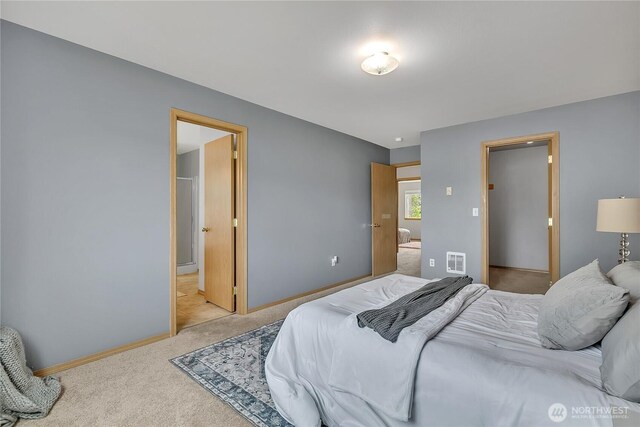 1302 110th St E Unit 37, Tacoma, WA 98445 - bedroom with carpet and baseboards