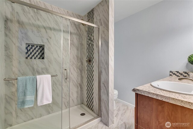 1302 110th St E Unit 37, Tacoma, WA 98445 - bathroom with vanity and a marble finish shower