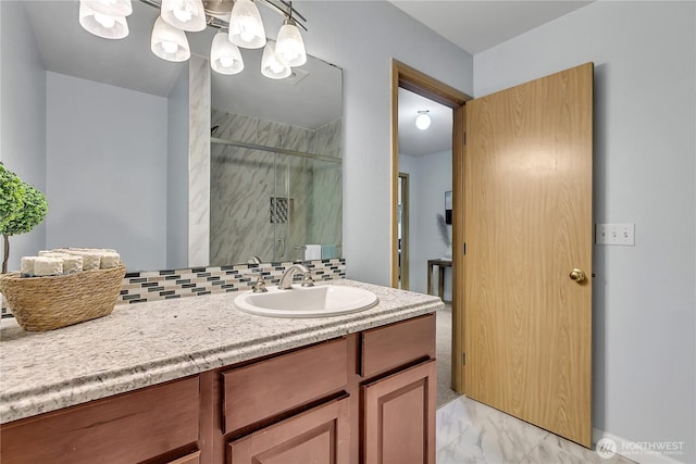 1302 110th St E Unit 37, Tacoma, WA 98445 - bathroom featuring a marble finish shower, vanity, marble finish flooring, and a chandelier