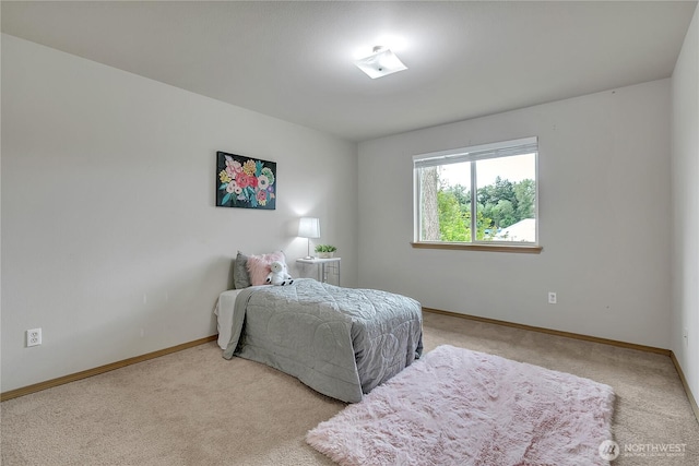 1302 110th St E Unit 37, Tacoma, WA 98445 - bedroom featuring light colored carpet and baseboards