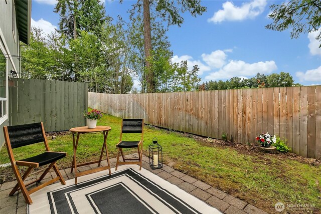 1302 110th St E Unit 37, Tacoma, WA 98445 - fenced backyard featuring a patio area