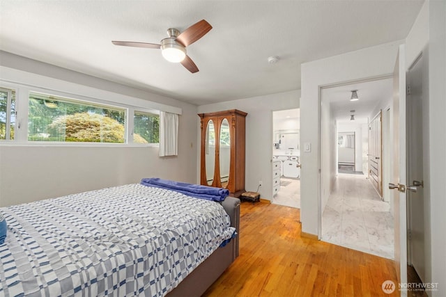118 Highland Dr, Bellingham, WA 98225 - bedroom featuring light wood finished floors, ceiling fan, and ensuite bathroom