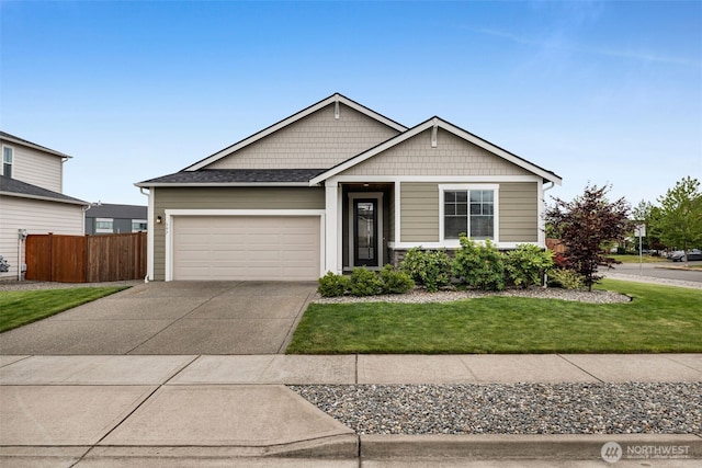 397 N Foster St, Buckley, WA 98321 - view of front facade featuring concrete driveway and an attached garage