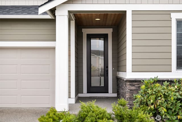 397 N Foster St, Buckley, WA 98321 - doorway to property with a garage