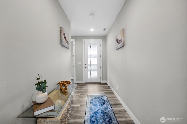 397 N Foster St, Buckley, WA 98321 - doorway with baseboards and wood finished floors