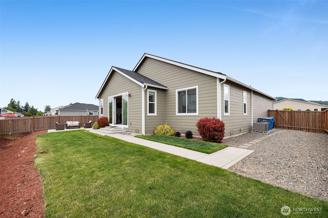 397 N Foster St, Buckley, WA 98321 - rear view of property featuring an outdoor living space and a fenced backyard