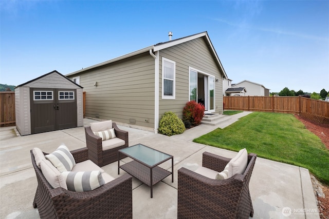397 N Foster St, Buckley, WA 98321 - fenced backyard with a shed, a patio area, entry steps, and an outdoor hangout area