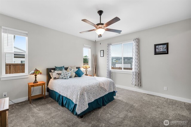 397 N Foster St, Buckley, WA 98321 - carpeted bedroom featuring baseboards and a ceiling fan