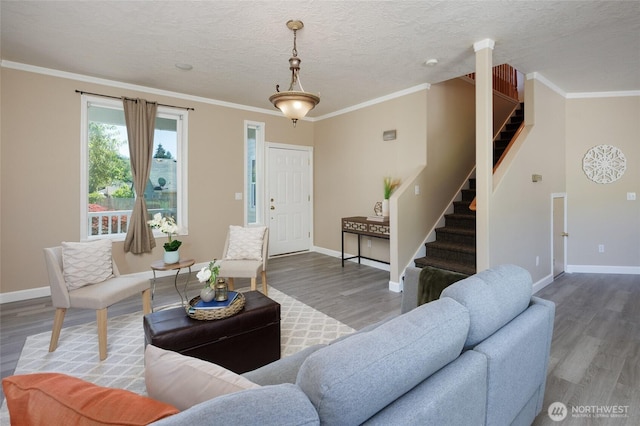 2537 Kristine Ct, Centralia, WA 98531 - living area with wood finished floors, stairway, crown molding, and a textured ceiling