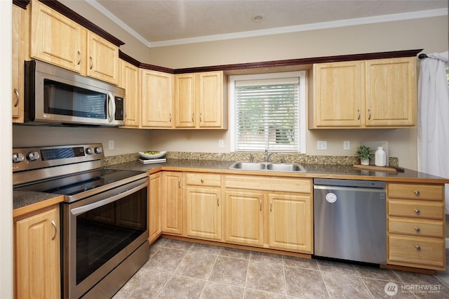 2537 Kristine Ct, Centralia, WA 98531 - kitchen with appliances with stainless steel finishes, light brown cabinets, crown molding, and dark countertops