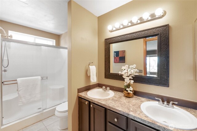 2819 Z St SE, Auburn, WA 98002 - bathroom featuring a stall shower, double vanity, and tile patterned floors