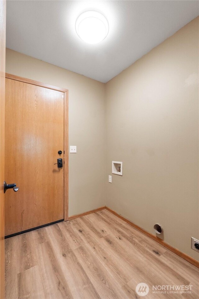 2819 Z St SE, Auburn, WA 98002 - laundry area featuring light wood finished floors, washer hookup, and electric dryer hookup