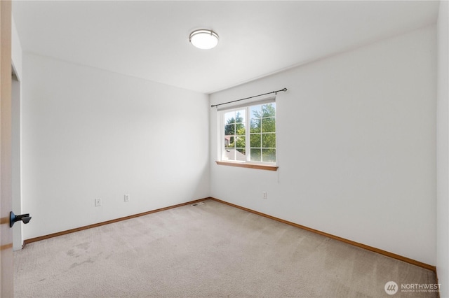 2819 Z St SE, Auburn, WA 98002 - empty room featuring carpet floors and baseboards