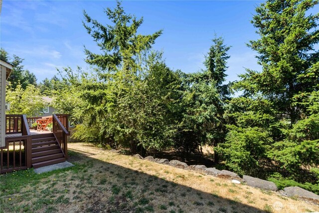 2819 Z St SE, Auburn, WA 98002 - view of grassy yard featuring a wooden deck