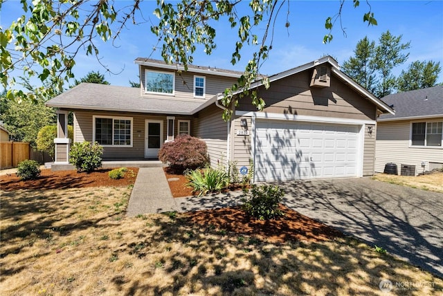 2819 Z St SE, Auburn, WA 98002 - traditional-style home featuring an attached garage, driveway, and covered porch