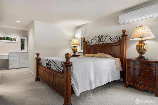 5222 Mahncke Rd SW, Longbranch, WA 98351 - bedroom featuring an AC wall unit, light carpet, and recessed lighting