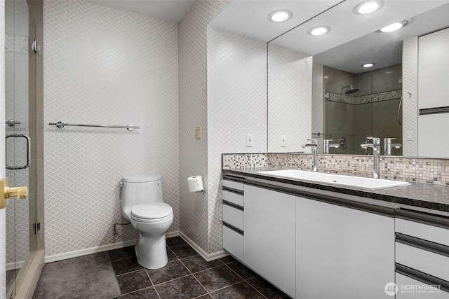 5222 Mahncke Rd SW, Longbranch, WA 98351 - bathroom with vanity, a stall shower, tile patterned floors, tile walls, and recessed lighting