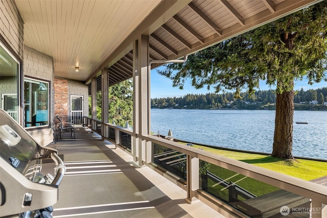 5222 Mahncke Rd SW, Longbranch, WA 98351 - view of patio with a water view