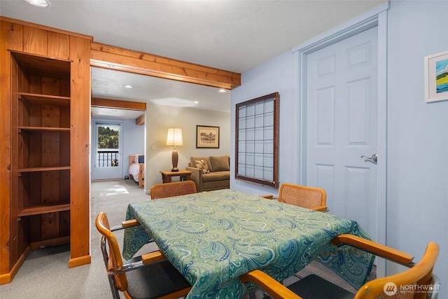 5222 Mahncke Rd SW, Longbranch, WA 98351 - dining room with light carpet, beamed ceiling, and recessed lighting