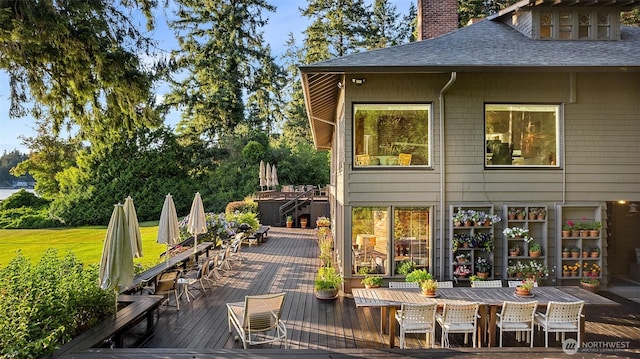 5222 Mahncke Rd SW, Longbranch, WA 98351 - wooden deck featuring outdoor dining area