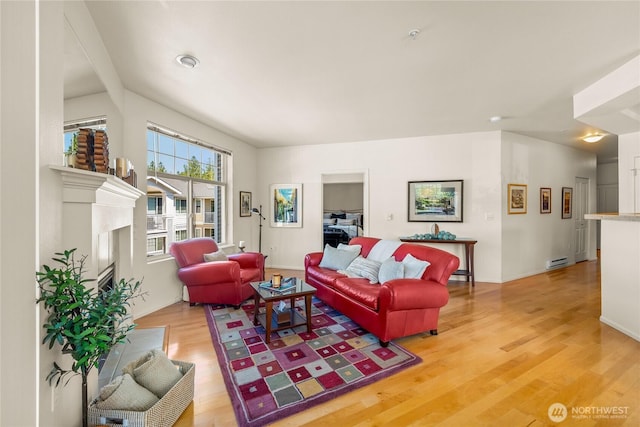 2244 SE 132nd Ave Unit B217, Bellevue, WA 98005 - living room with light wood-style flooring and vaulted ceiling