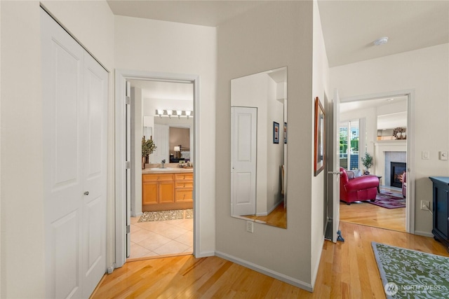 2244 SE 132nd Ave Unit B217, Bellevue, WA 98005 - hallway featuring light wood-type flooring