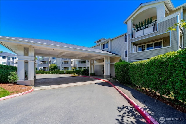 2244 SE 132nd Ave Unit B217, Bellevue, WA 98005 - parking lot featuring a residential view