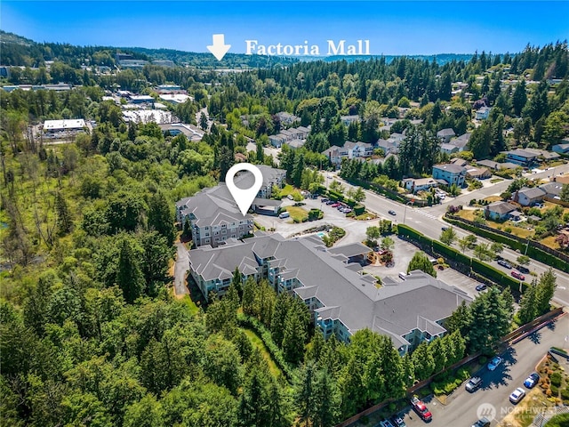 2244 SE 132nd Ave Unit B217, Bellevue, WA 98005 - aerial view of residential area featuring a heavily wooded area