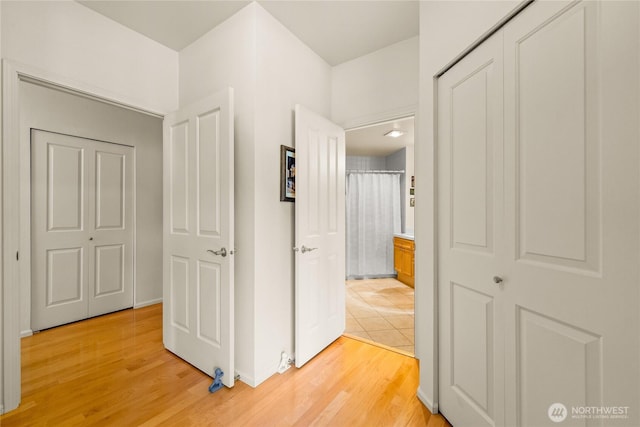 2244 SE 132nd Ave Unit B217, Bellevue, WA 98005 - hall featuring light wood-style floors