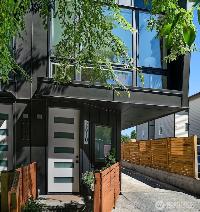 2610 E Yesler Way Unit A, Seattle, WA 98122 - view of exterior entry featuring board and batten siding