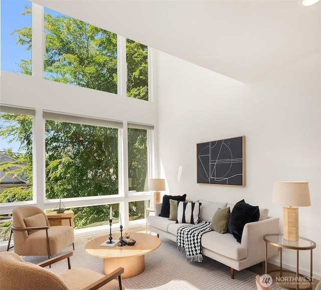 2610 E Yesler Way Unit A, Seattle, WA 98122 - living room featuring a towering ceiling