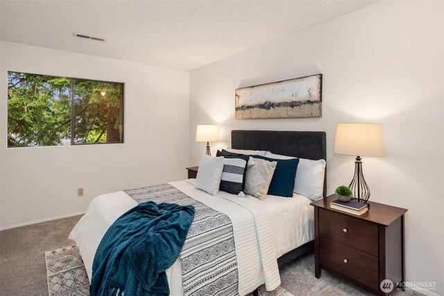 14132 74th Pl NE Unit 16D, Kirkland, WA 98034 - carpeted bedroom featuring baseboards