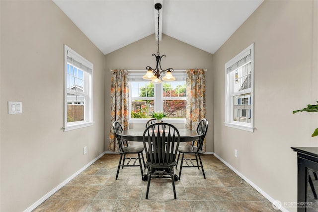 1702 7th Ave SW, Puyallup, WA 98371 - dining room featuring stone finish floors and a chandelier