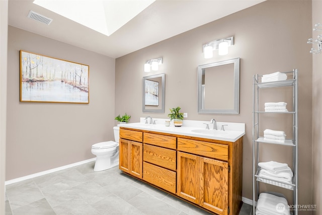 1702 7th Ave SW, Puyallup, WA 98371 - bathroom with double vanity and a skylight