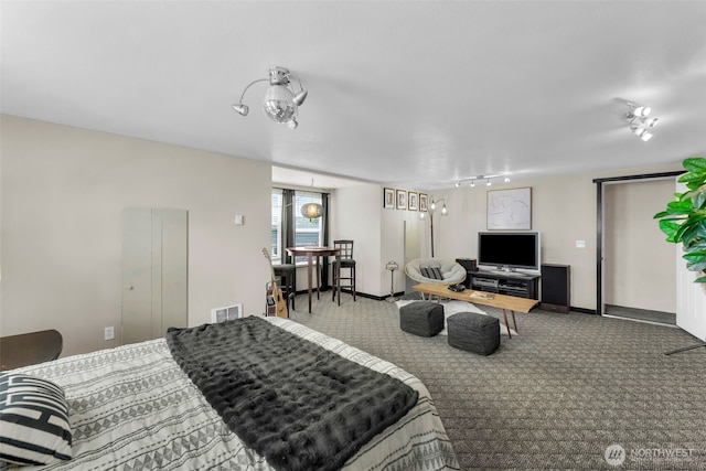 1702 7th Ave SW, Puyallup, WA 98371 - bedroom with carpet and baseboards