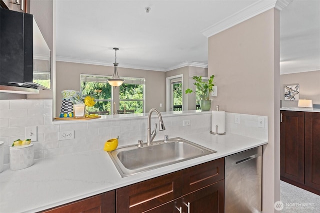 33020 10th Ave SW Unit M302, Federal Way, WA 98023 - kitchen with dishwasher, light countertops, backsplash, ornamental molding, and hanging light fixtures