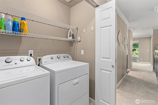 33020 10th Ave SW Unit M302, Federal Way, WA 98023 - laundry area with washer and clothes dryer, carpet flooring, crown molding, and baseboard heating