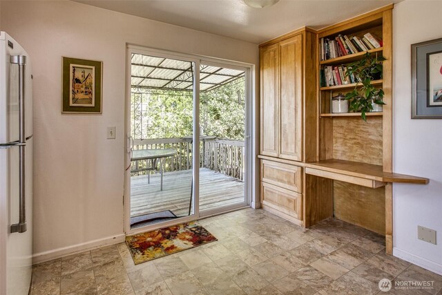 2120 Niagara Dr, Bellingham, WA 98229 - entryway featuring baseboards and light stone finish floors
