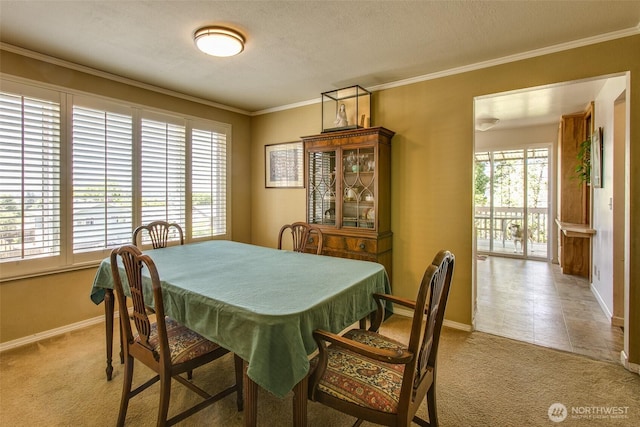 2120 Niagara Dr, Bellingham, WA 98229 - dining space with light carpet, healthy amount of natural light, and ornamental molding