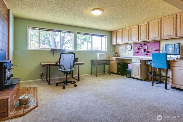 2120 Niagara Dr, Bellingham, WA 98229 - office with light colored carpet, a textured ceiling, and a wood stove